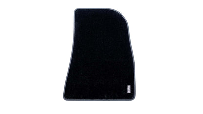 Tapis de sol en matière moquette pour le plancher avant côté passager de la Tesla Model 3 Highland.