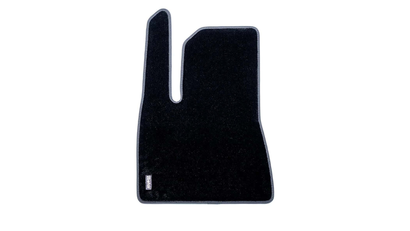 Tapis de sol en matière moquette pour le plancher avant côté conducteur de la Tesla Model 3 Highland.