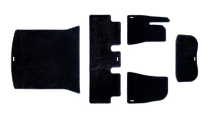 Kit complet de tapis de sol matière moquette pour la Tesla Model 3 Highland. Contient les tapis pour le frunk, le coffre arrière, et les planchers avant et arrière